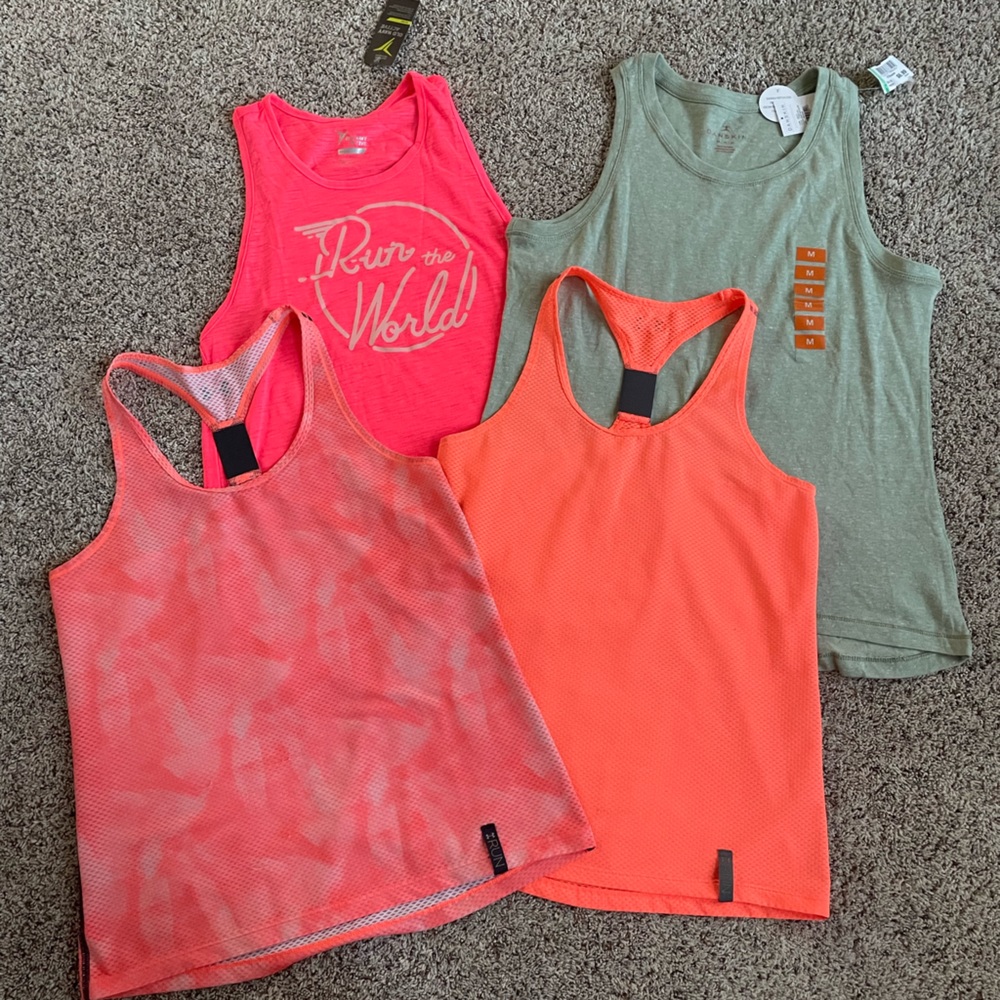 *lot of 4* womens Under Armour, ON, Danskin MED tank tops